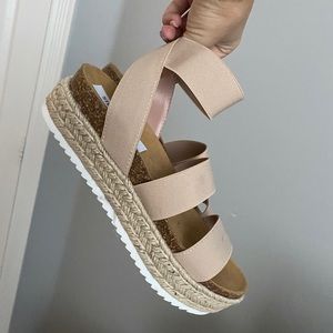 Steve Madden platform shoes.